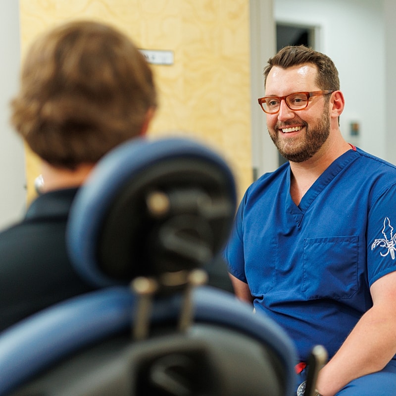Doctor consulting with patient in medical setting