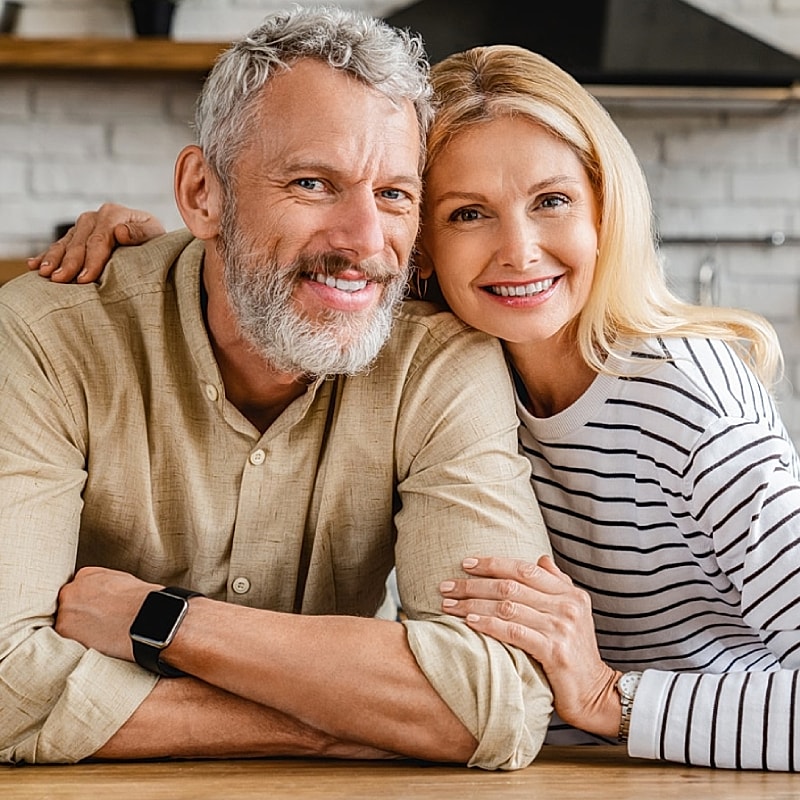 Happy couple enjoying time together at home.